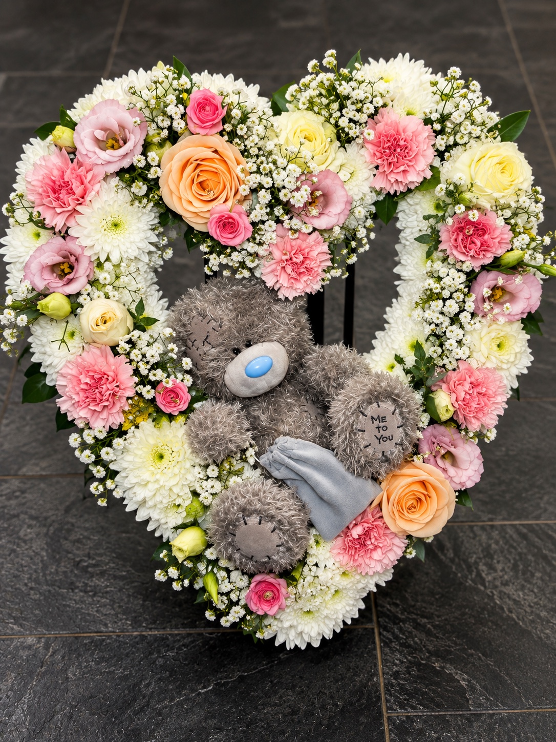 Tatty Teddy heart floral tribute