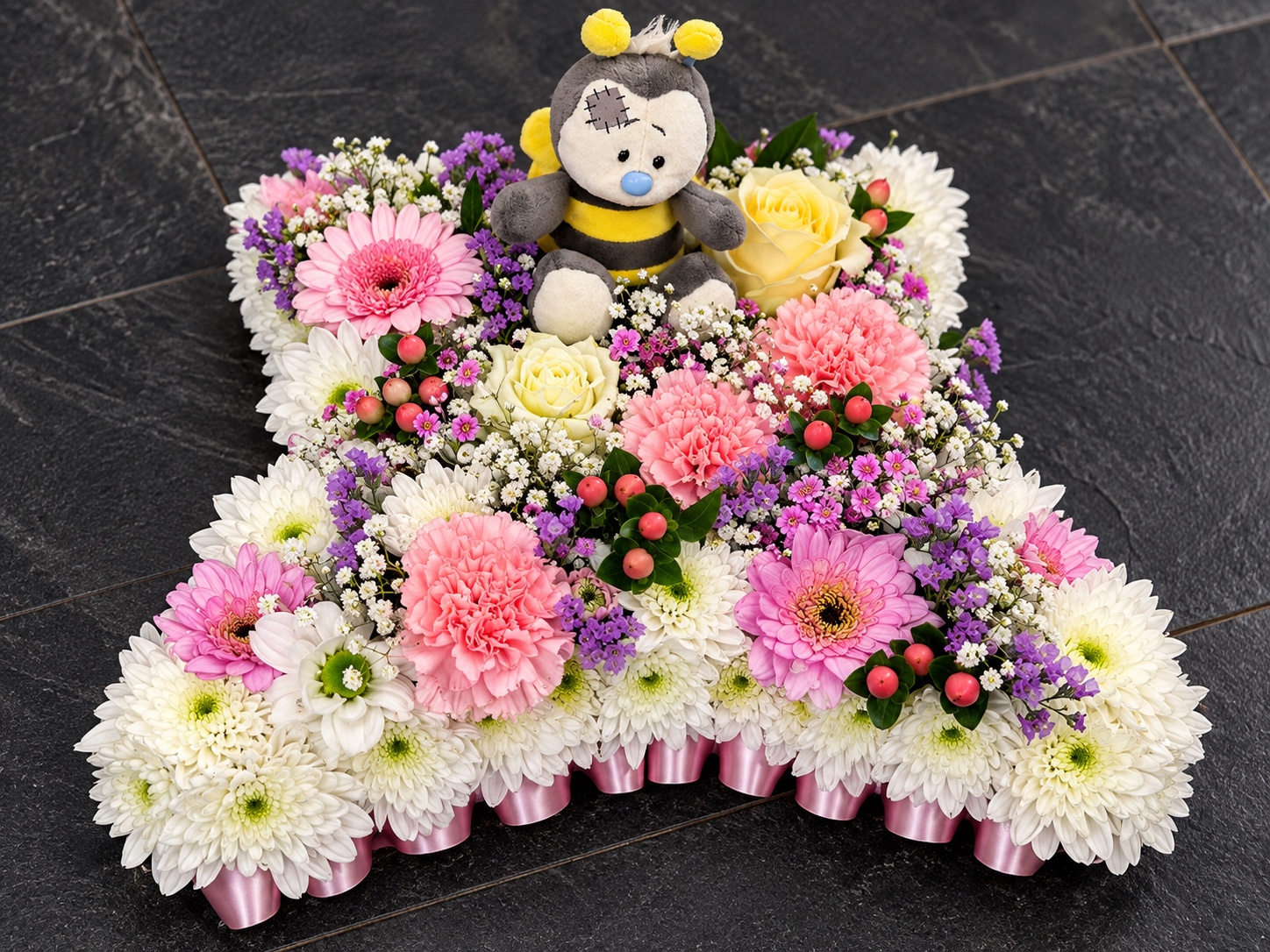 Bespoke teddy bear floral tribute